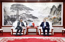 联合国世界粮食计划署驻华代表赵兵拜会国家粮食和物资储备局局长刘焕鑫